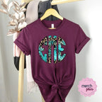 Turquoise Leopard Monogram Graphic Tee- Maroon Shirt - Merch Girls