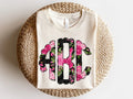 Pink and Black Floral Monogram Graphic Tee - Merch Girls