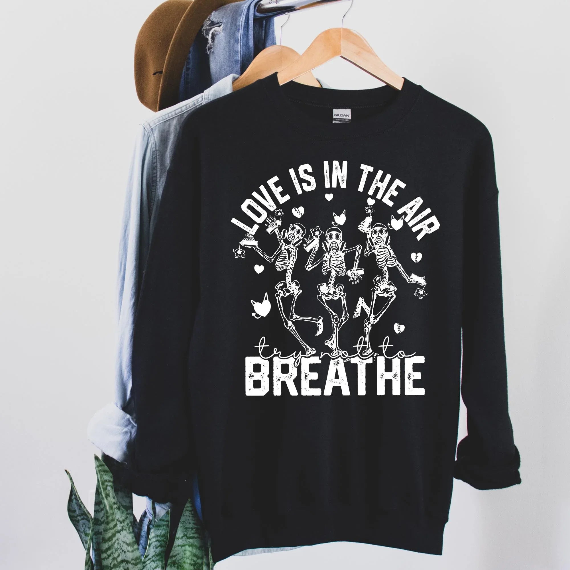 Love is in the Air Don't Breathe Dancing Skeletons Valentine's Day Graphic Sweatshirt - Merch Girls