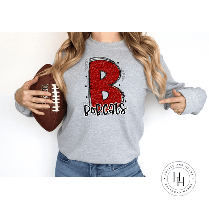 Bobcats Red Glitter Varsity Doodle Unisex Tee