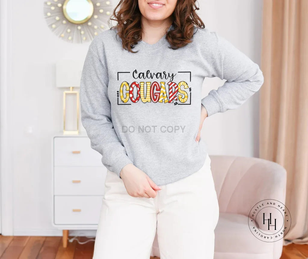 Calvary Cougars Red/Yellow/White Doodle Graphic Tee - Merch Girls