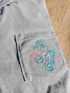 Comfort Color Swirly Fancy Single Letter Monogram Embroidered Pocket Tee - Merch Girls
