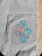Comfort Color Swirly Fancy Single Letter Monogram Embroidered Pocket Tee - Merch Girls