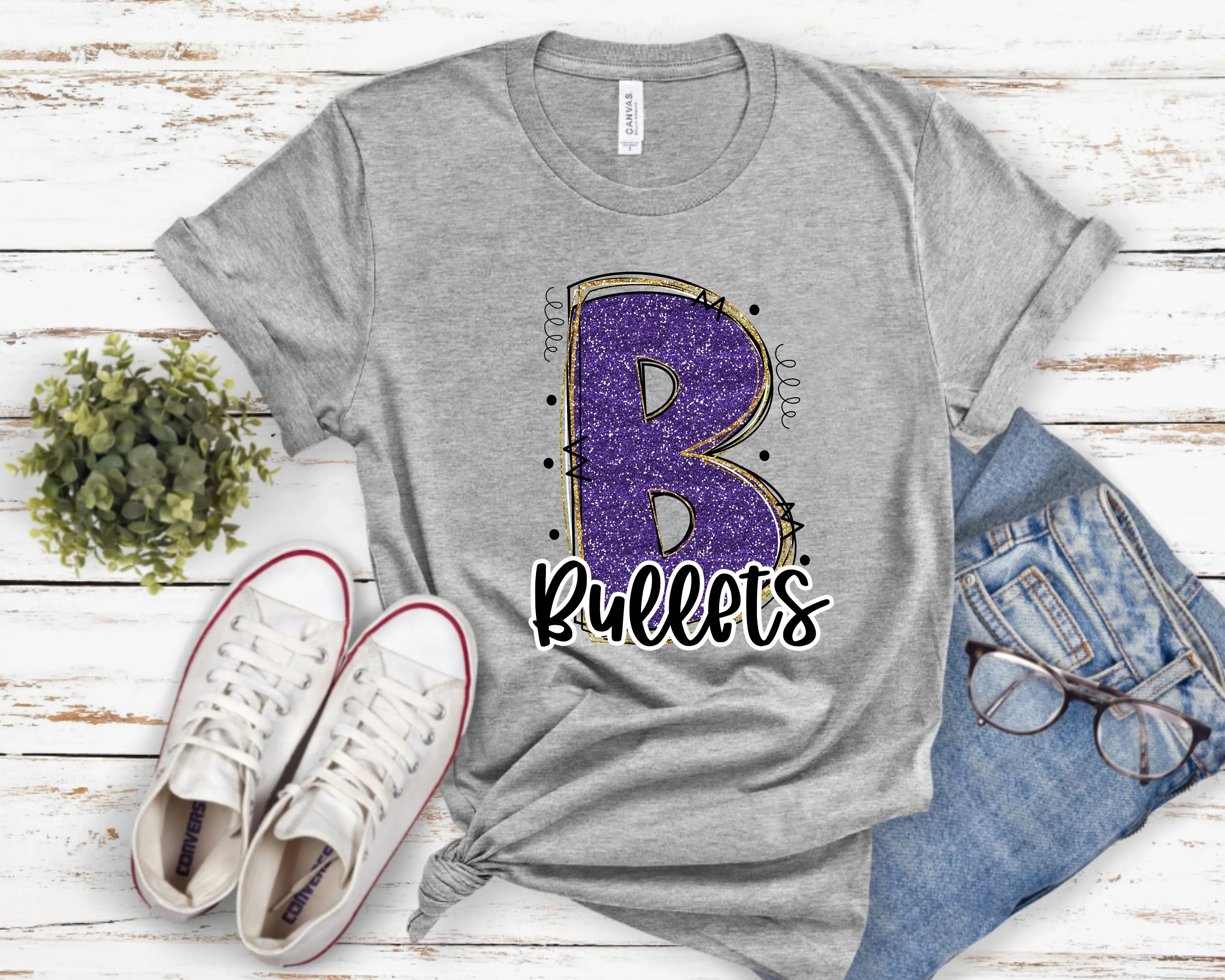Bullets Glitter Varsity Doodle Graphic Tee - Merch Girls