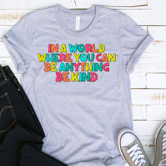 In A World Where You Can Be Anything Kind Graphic Tee Dtg