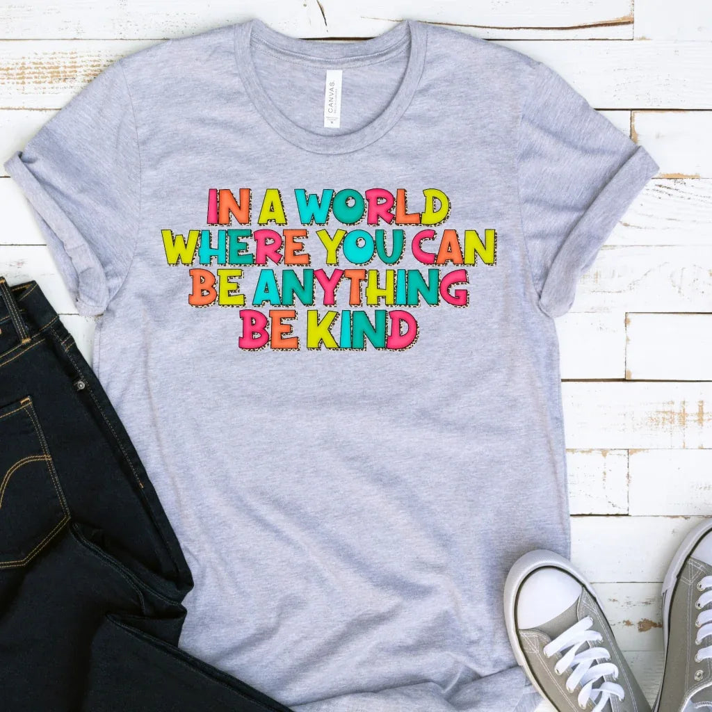 In A World Where You Can Be Anything Be Kind Graphic Tee - Merch Girls