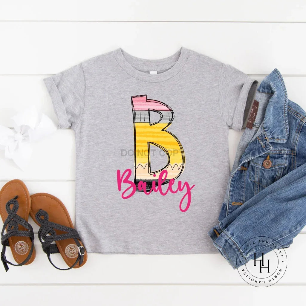 Large Letter Pencil Alpha Graphic Tee - Merch Girls